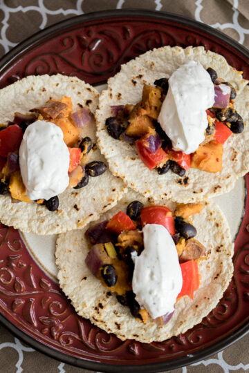 Spicy Sweet Potato & Black Bean Tacos with Garlic Yogurt Sauce