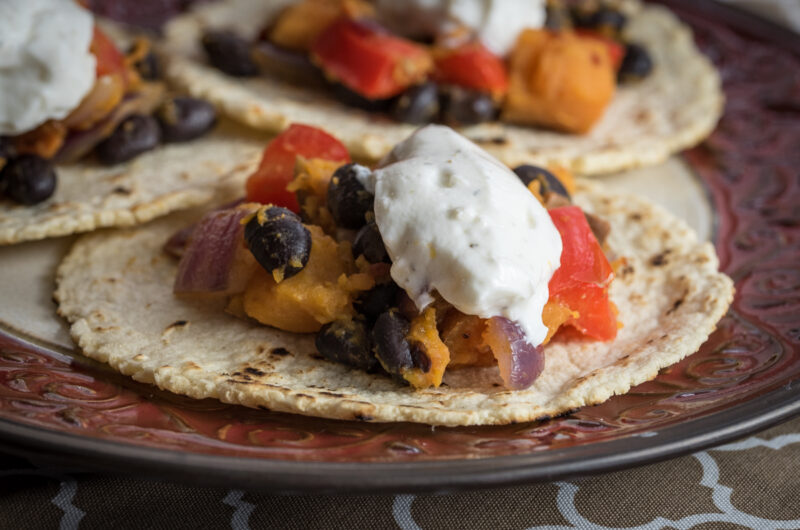 Spicy Sweet Potato & Black Bean Tacos with Garlic Yogurt Sauce